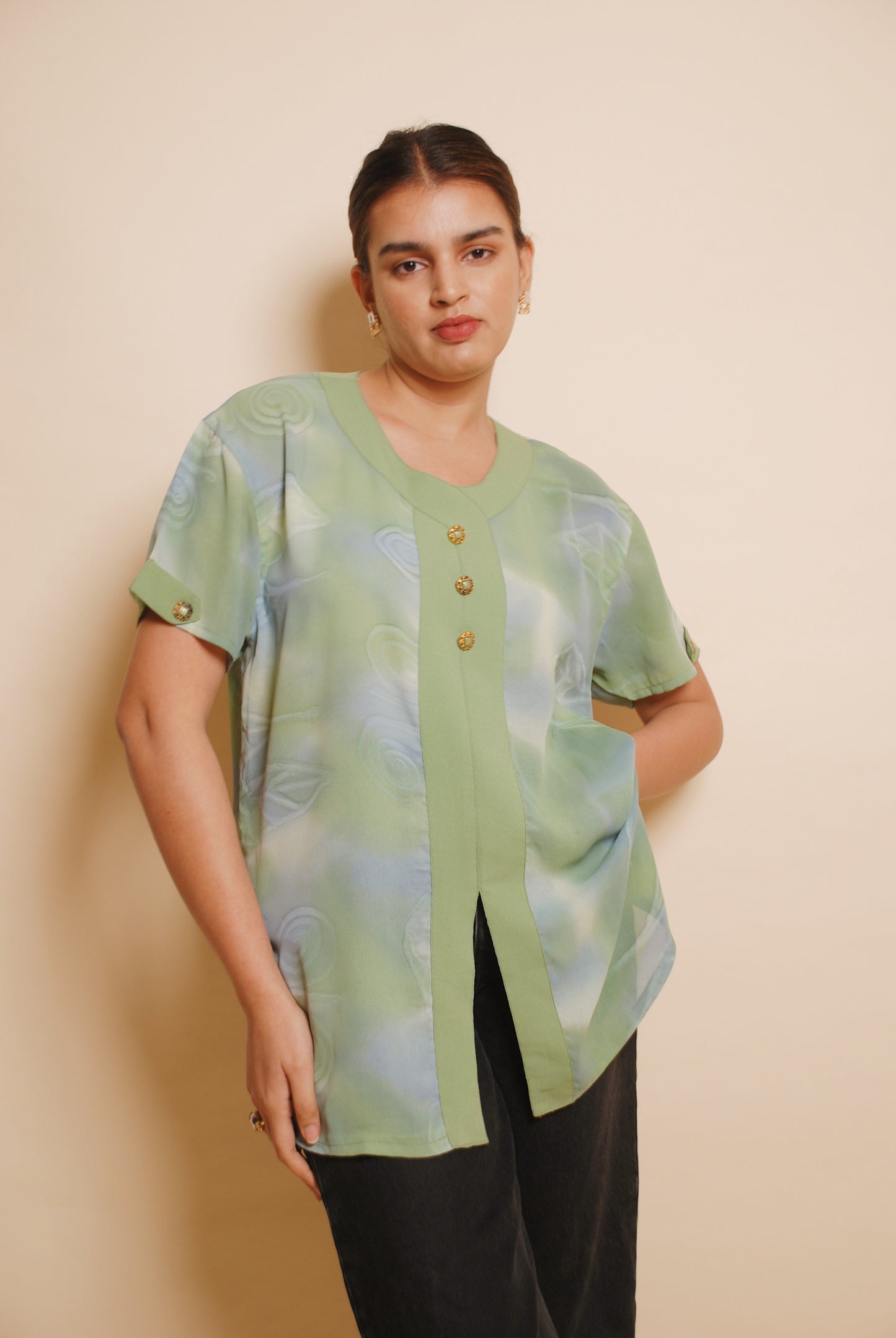 Green u-neck blouse with ornamental buttons