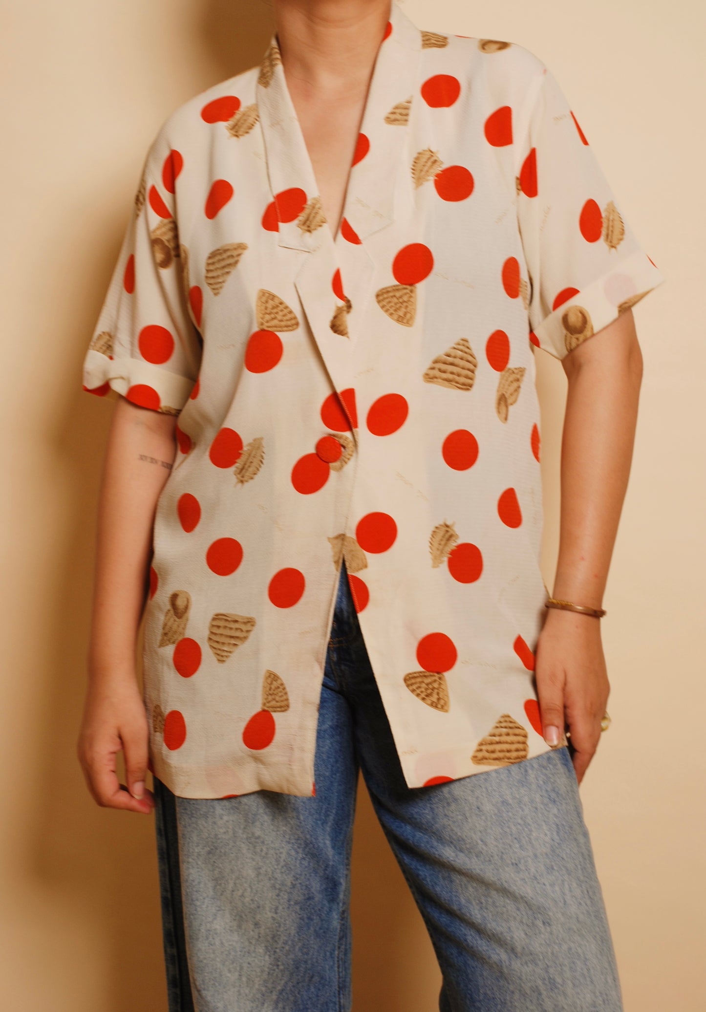 Cream & orange printed blouse