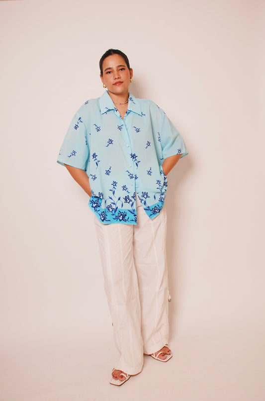 Light blue floral button-up shirt