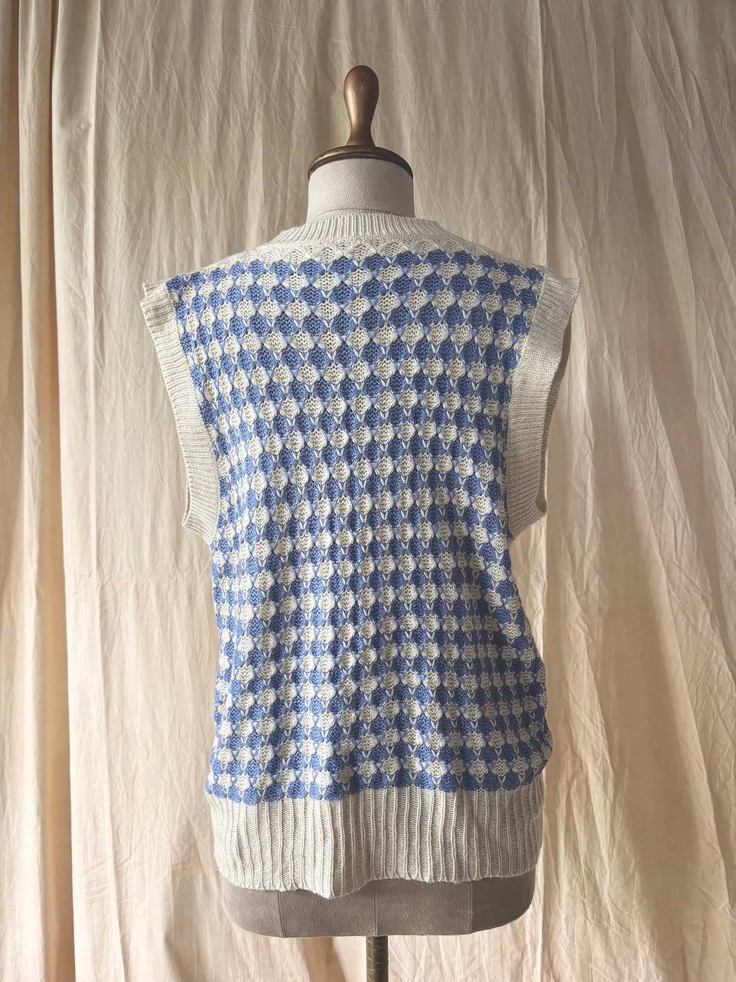 Blue knitted vest