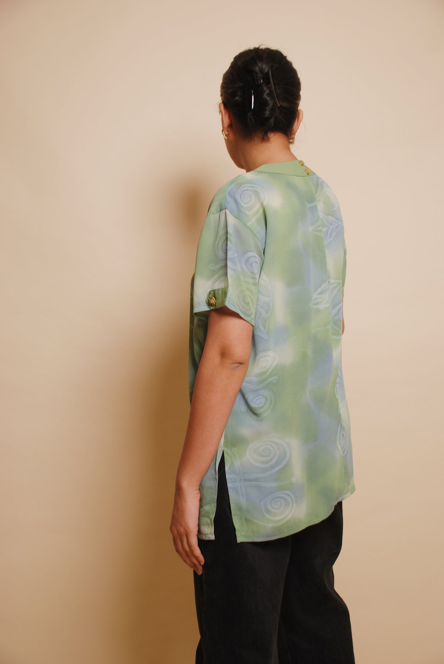 Green u-neck blouse with ornamental buttons