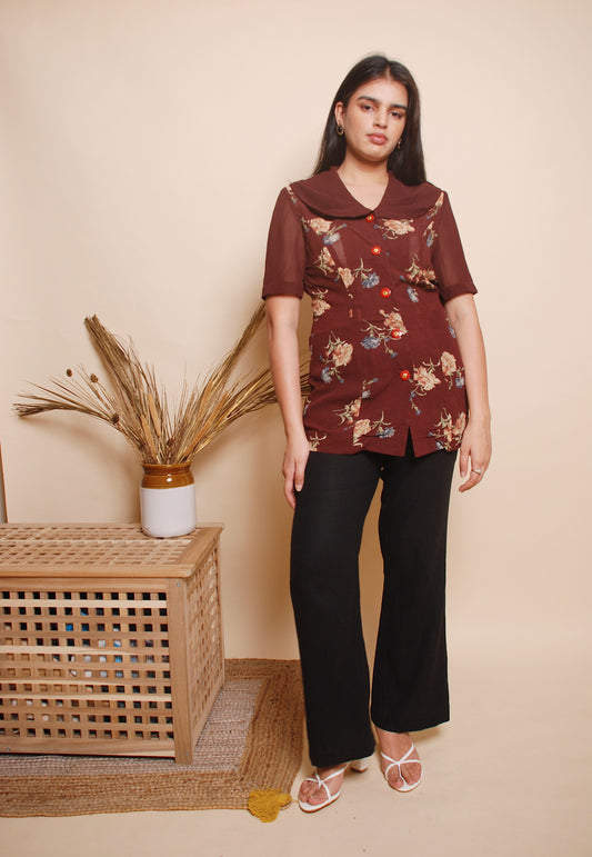 Floral blouse with ornamental buttons